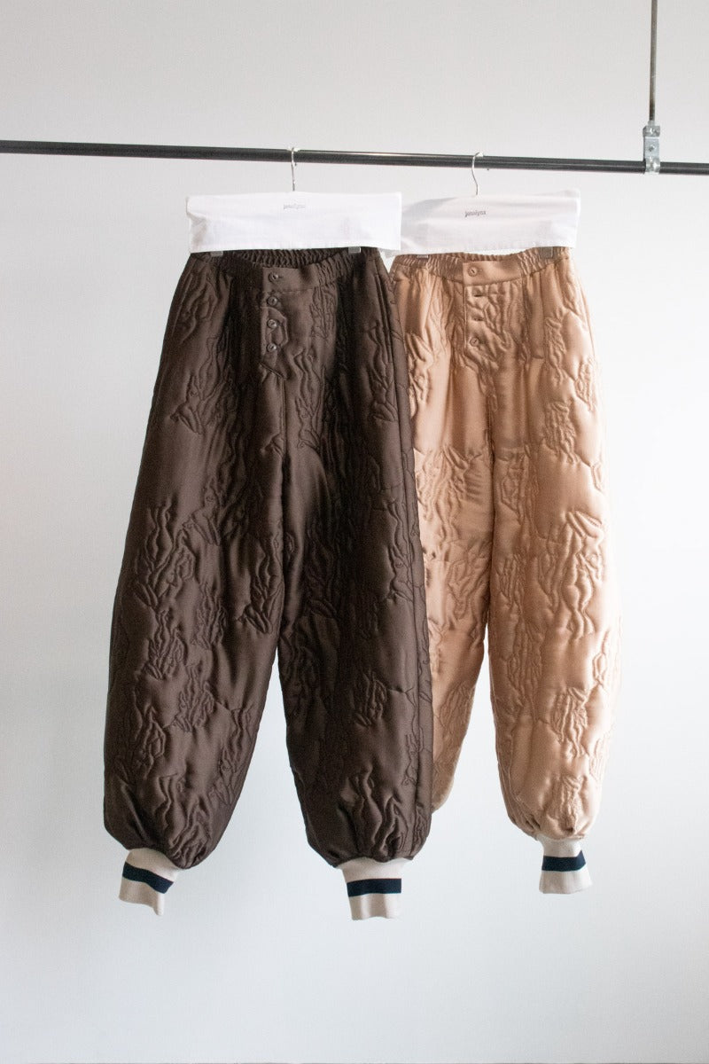 Nude pattern quilting pants